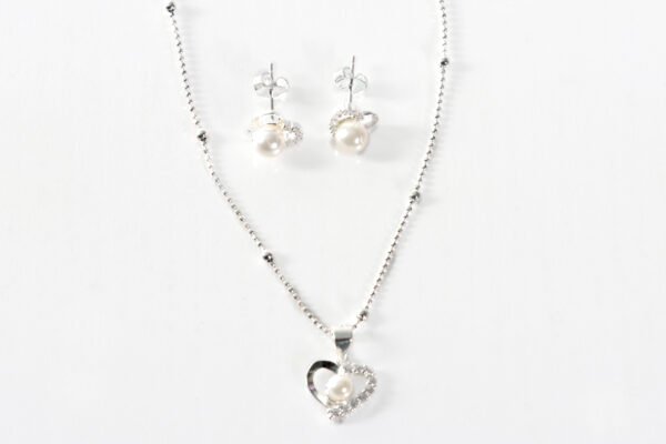 Conjunto corazón con perla